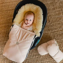 Kaiser Chancelière pour siège-auto bébé en peau d'agneau EMMY crème